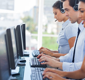 1 office workers typing webjpg IT Professionals Can Ease Compliance Woes with Upgraded Compliance Manager GRC Solution