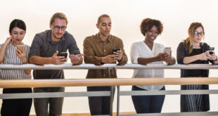 people smartphone iphone Tech makes people "more open-minded and charitable", finds Lenovo