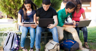 students using tech outside mainjpg How wireless connectivity is changing the face of higher education